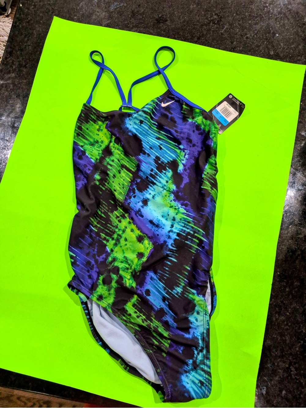 Nike Hydrastrong Amp Axis one-piece swimsuit featuring a vibrant green size 10